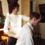 Photograph of students working with the Alexander Technique at the Centre for the Alexander Technique
