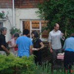Photograph of students and teachers from Centre for the Alexander Technique having a barbecue in Sussex