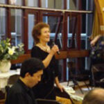 Photograph of Ellie Ribeaux, head of training, speaking at 30th Anniversary of Centre for the Alexander Technique Training Course party